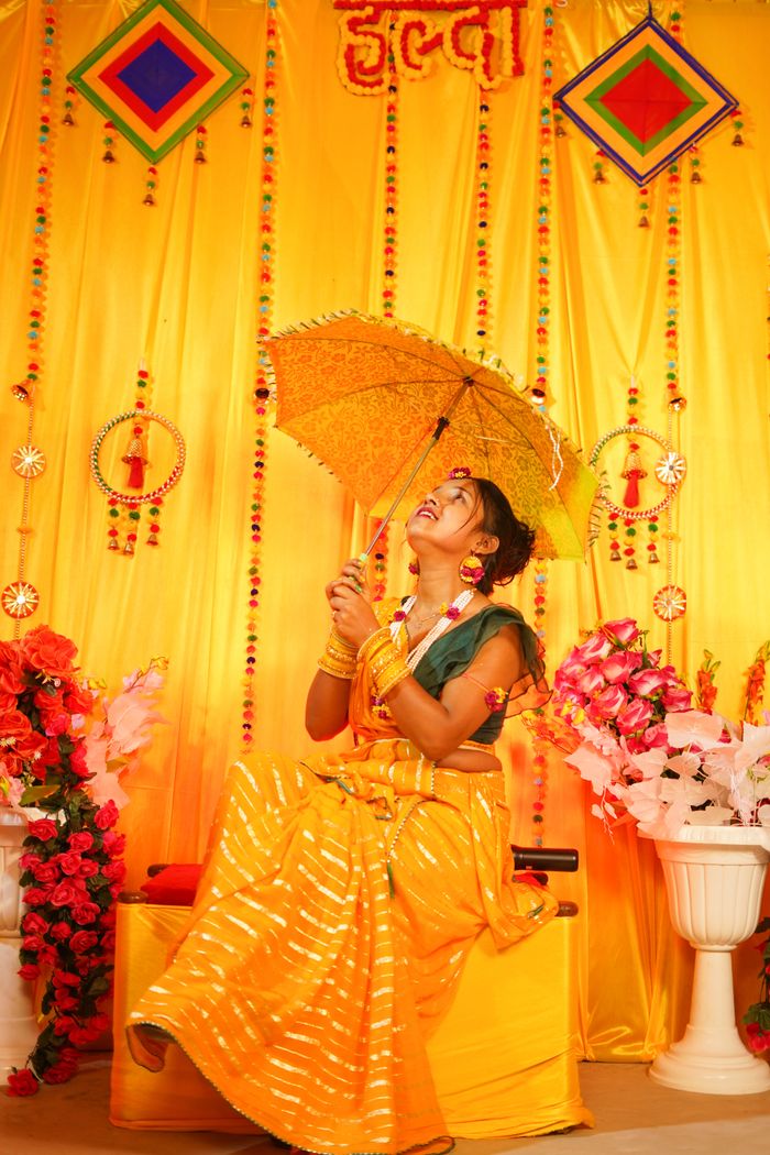 Bride with Haldi umbrella