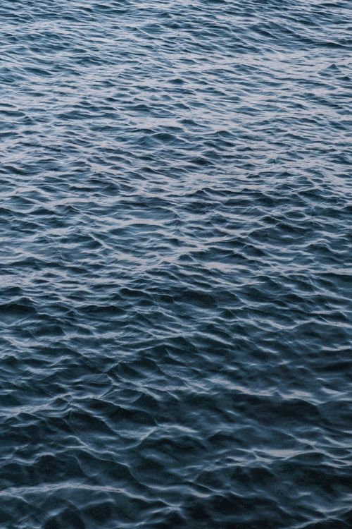 Free Tranquil ocean waves captured during the day in Jeju-si, a serene maritime landscape. Stock Photo