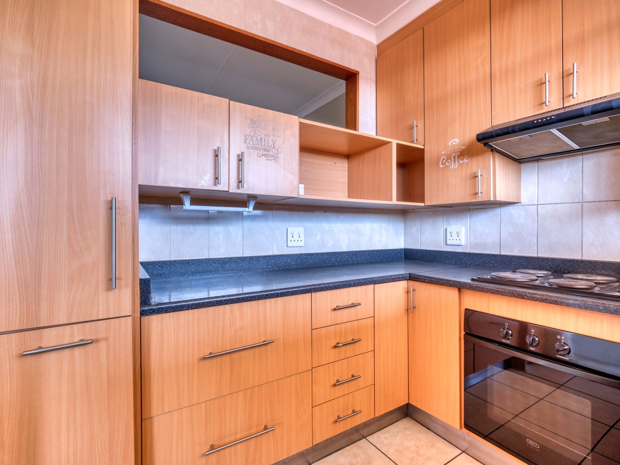 House Clearance in Whiston, North West — clearance team removing furniture from a property
