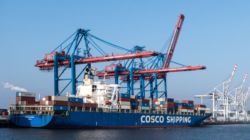Container ship and port cranes