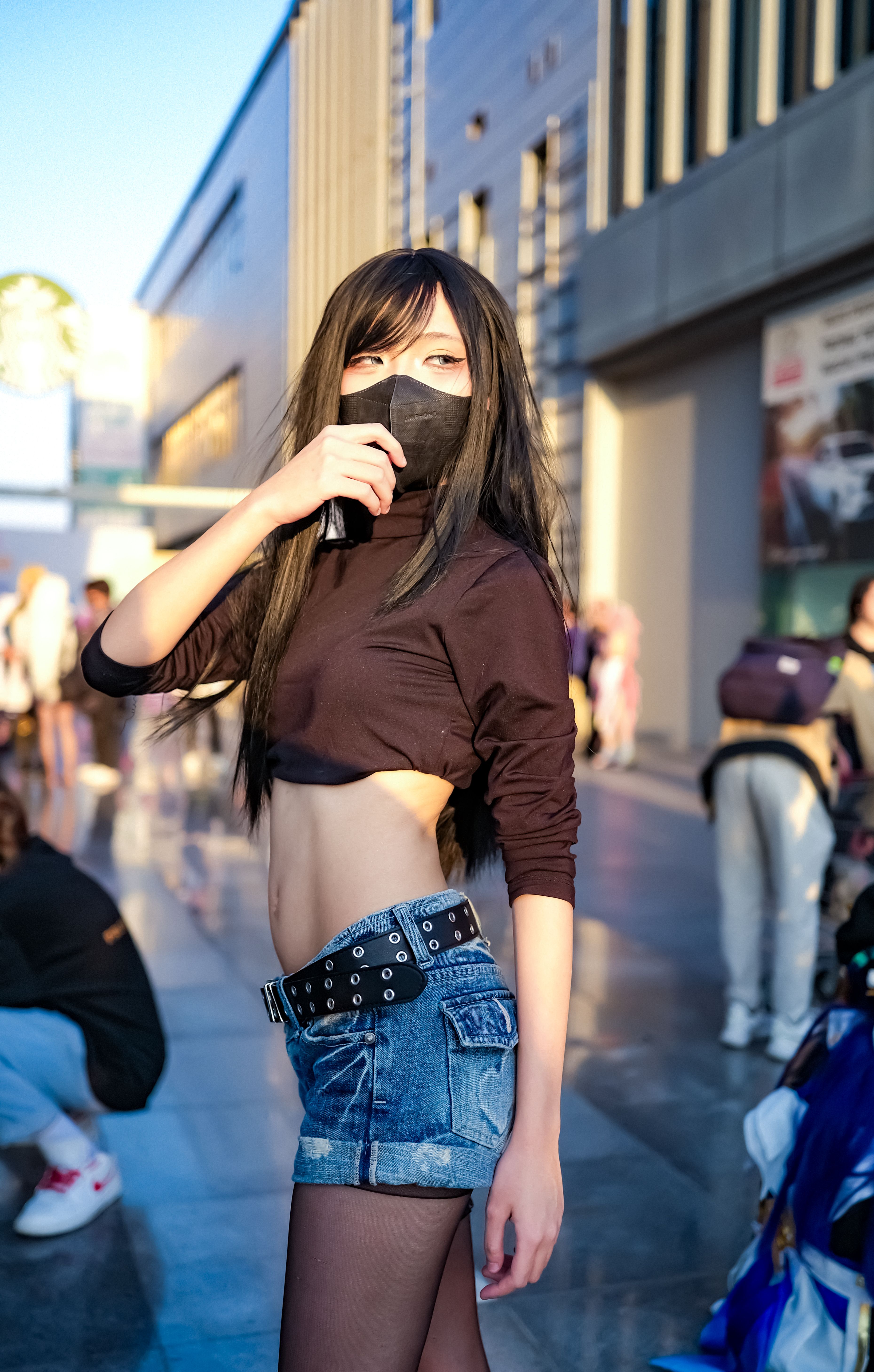 Stylish Cosplay Performer Outdoors in Sunlight · Free Stock Photo