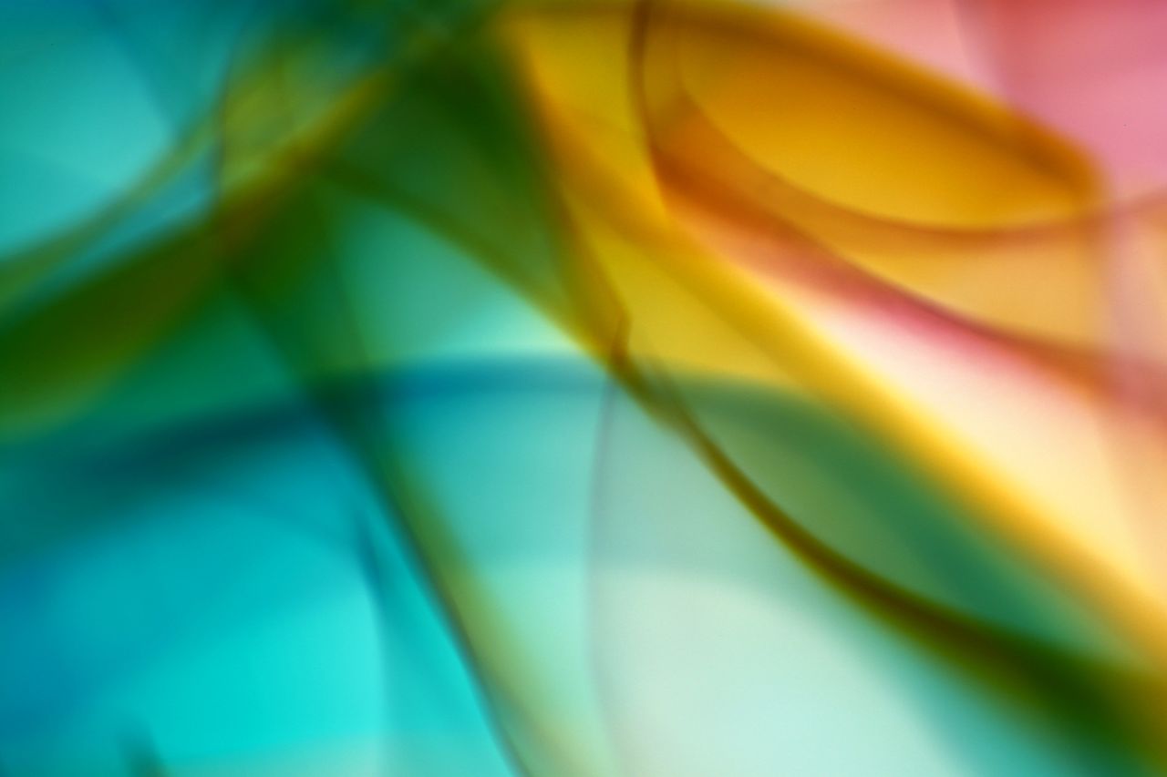 abstract vibrant colors creating a fluid wave like pattern suitable fo