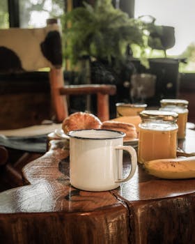 Warm rustic breakfast setup in Tanti, Córdoba, featuring coffee and homemade preserves.