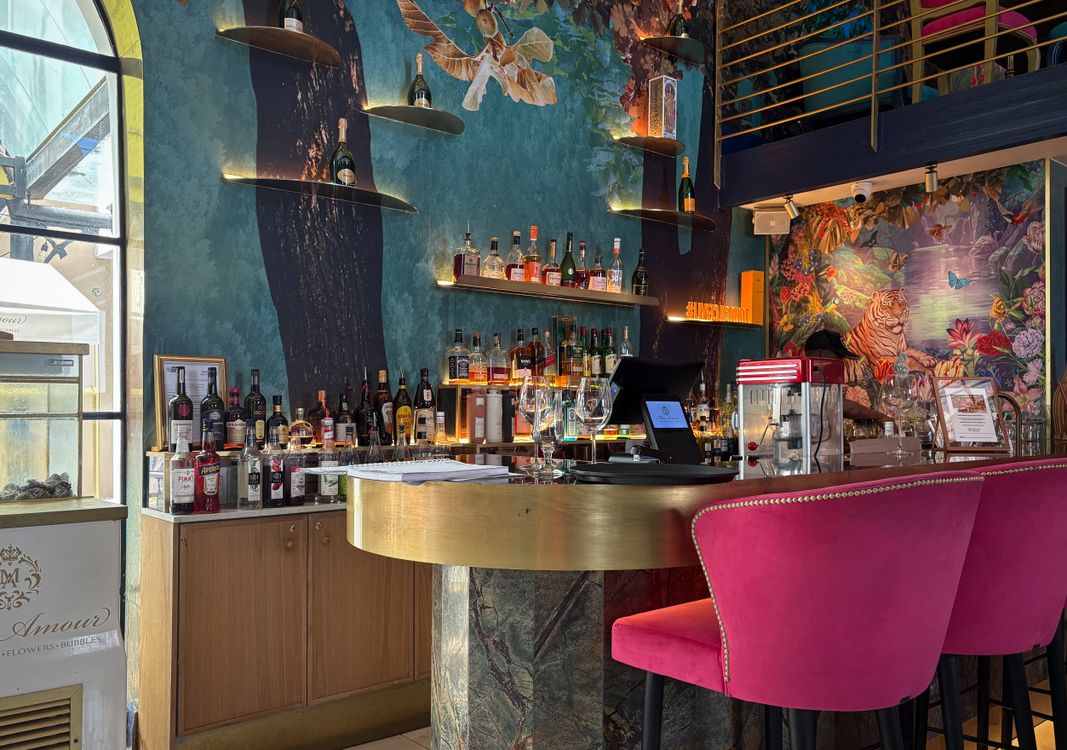 Vibrant Bar Interior with Eclectic Decor · Free Stock Photo
