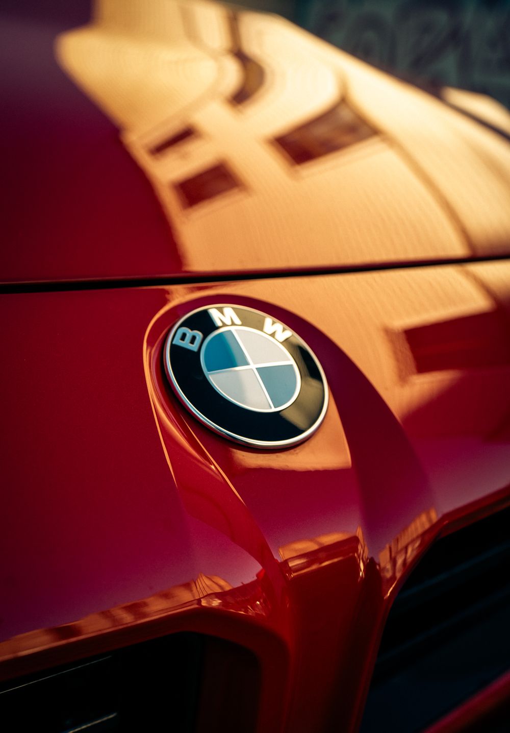 Close-up of a car bonnet with reflections