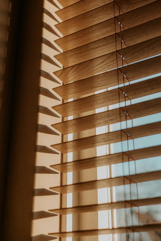 Sunlight through wooden blinds, photo by Eline Spee on Pexels