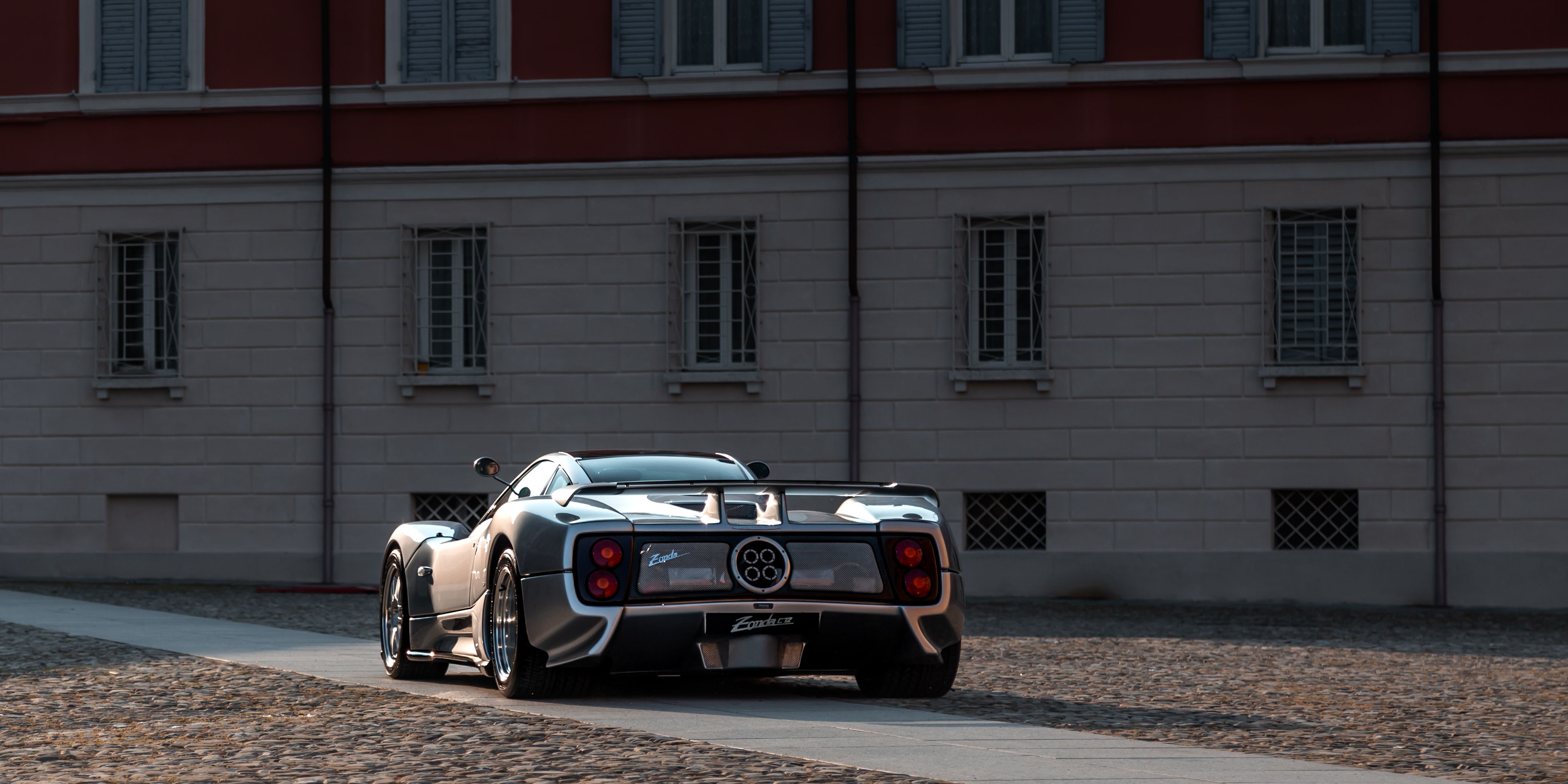 Luxury Supercar Parked in Urban Setting · Free Stock Photo
