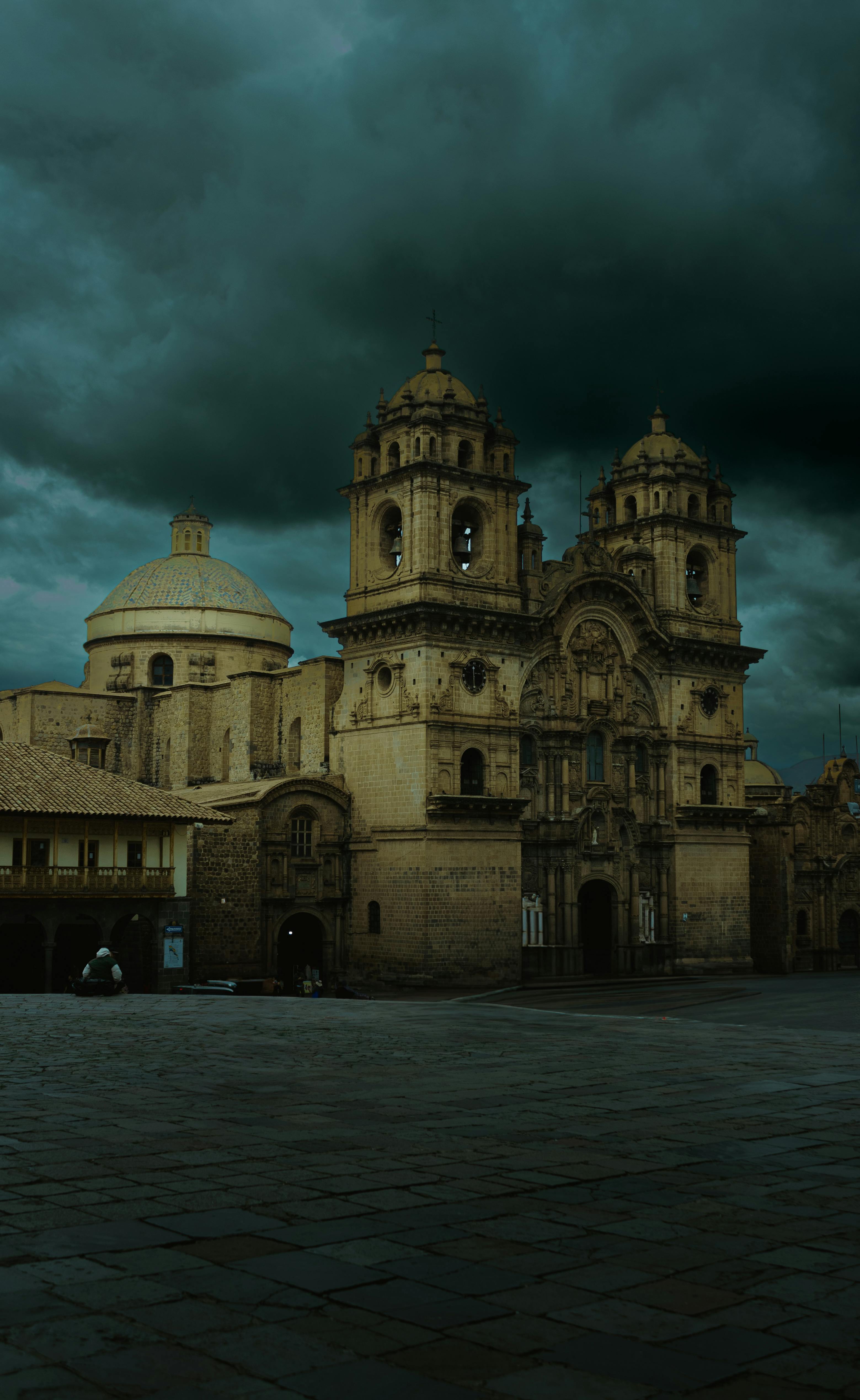 historic cathedral in cusco s central square at dusk