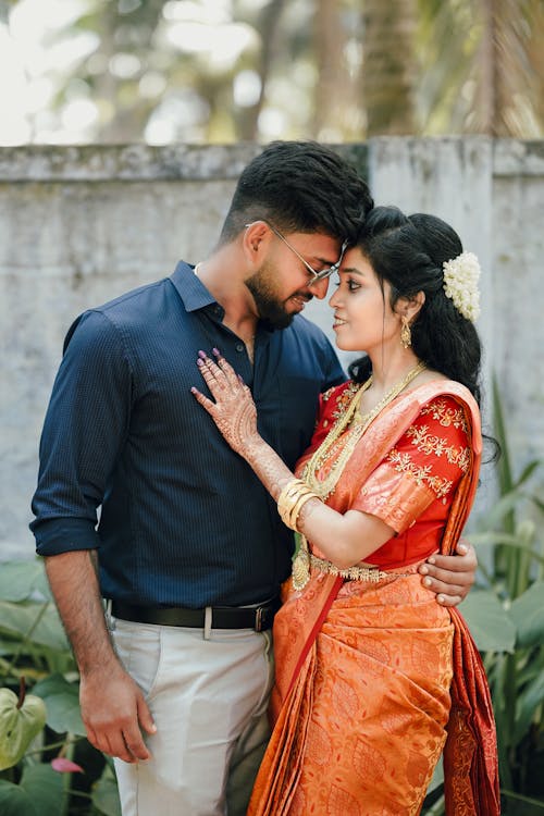 Indian Couple in Traditional Wedding Attire Outdoors Free Stock Photo Indian Couple in Traditional Wedding Attire Outdoors Free Stock Photo