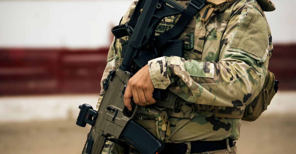 Tactical Rifle Crop Military Soldier in Tactical Gear Holding Rifle · Free Stock Photo