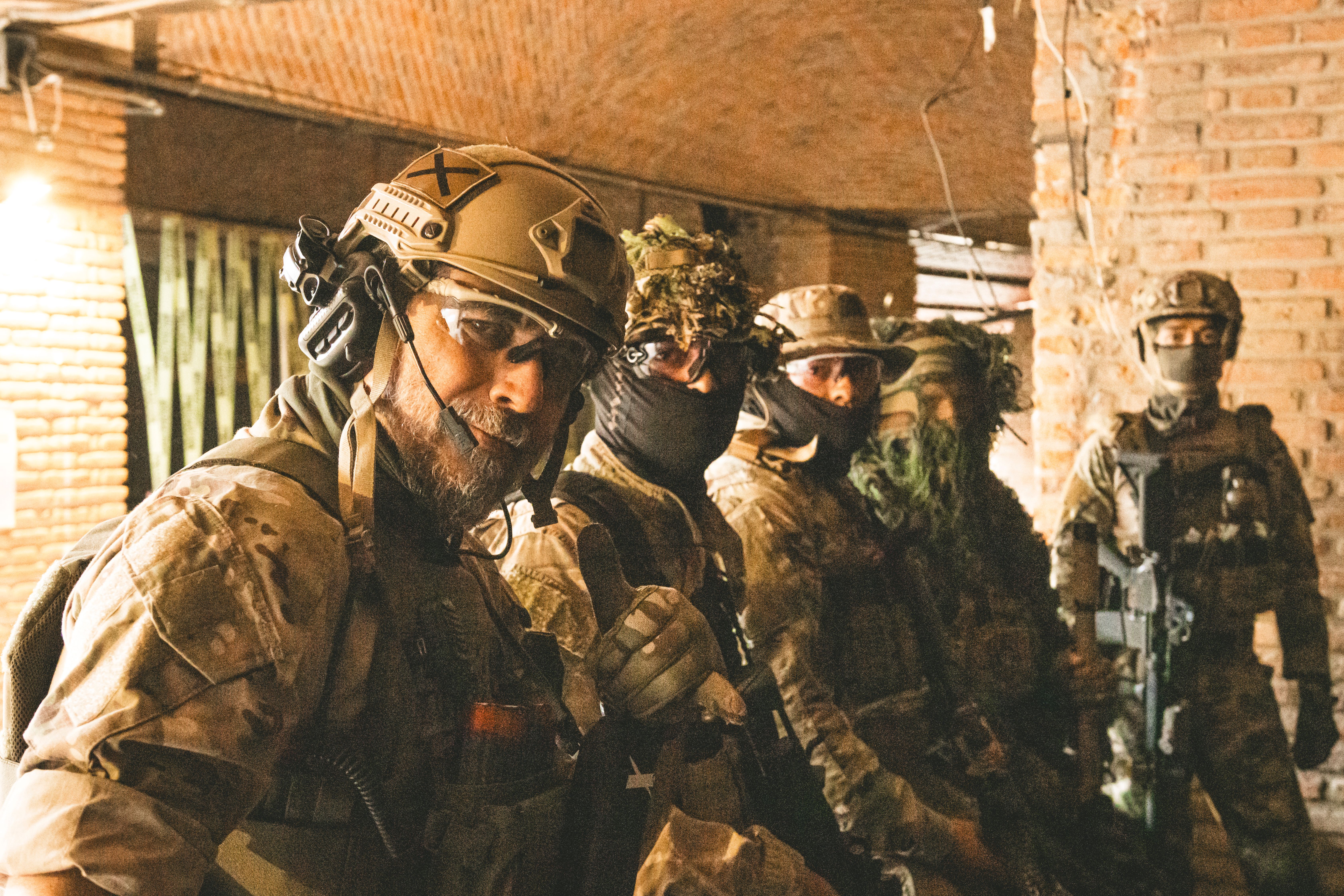 Group of Soldiers in Tactical Gear Indoors · Free Stock Photo