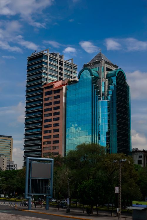 Free High-rise buildings reflecting the blue sky in an urban cityscape. Stock Photo