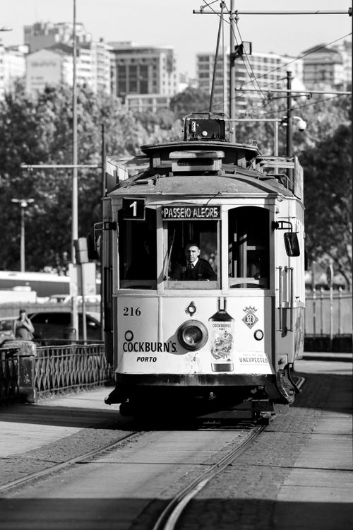 Free Black and white photo of a historic tram in Porto, Portugal, capturing urban heritage. Stock Photo