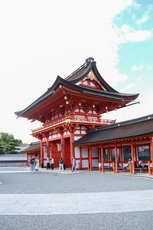 Free Classic Japanese temple architecture in Kyoto with vibrant red and white details. Stock Photo