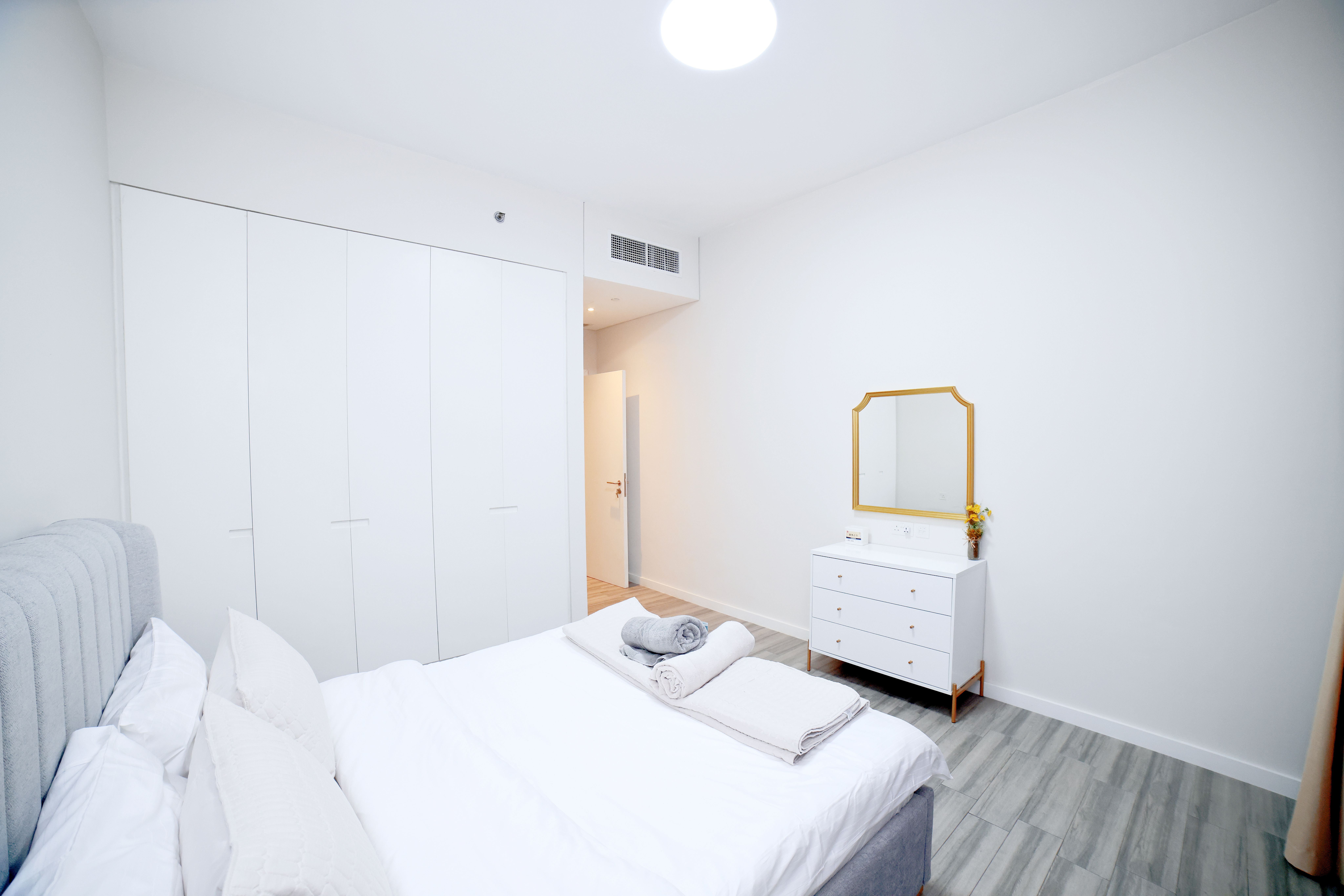 Minimalist White Bedroom with Modern Decor · Free Stock Photo