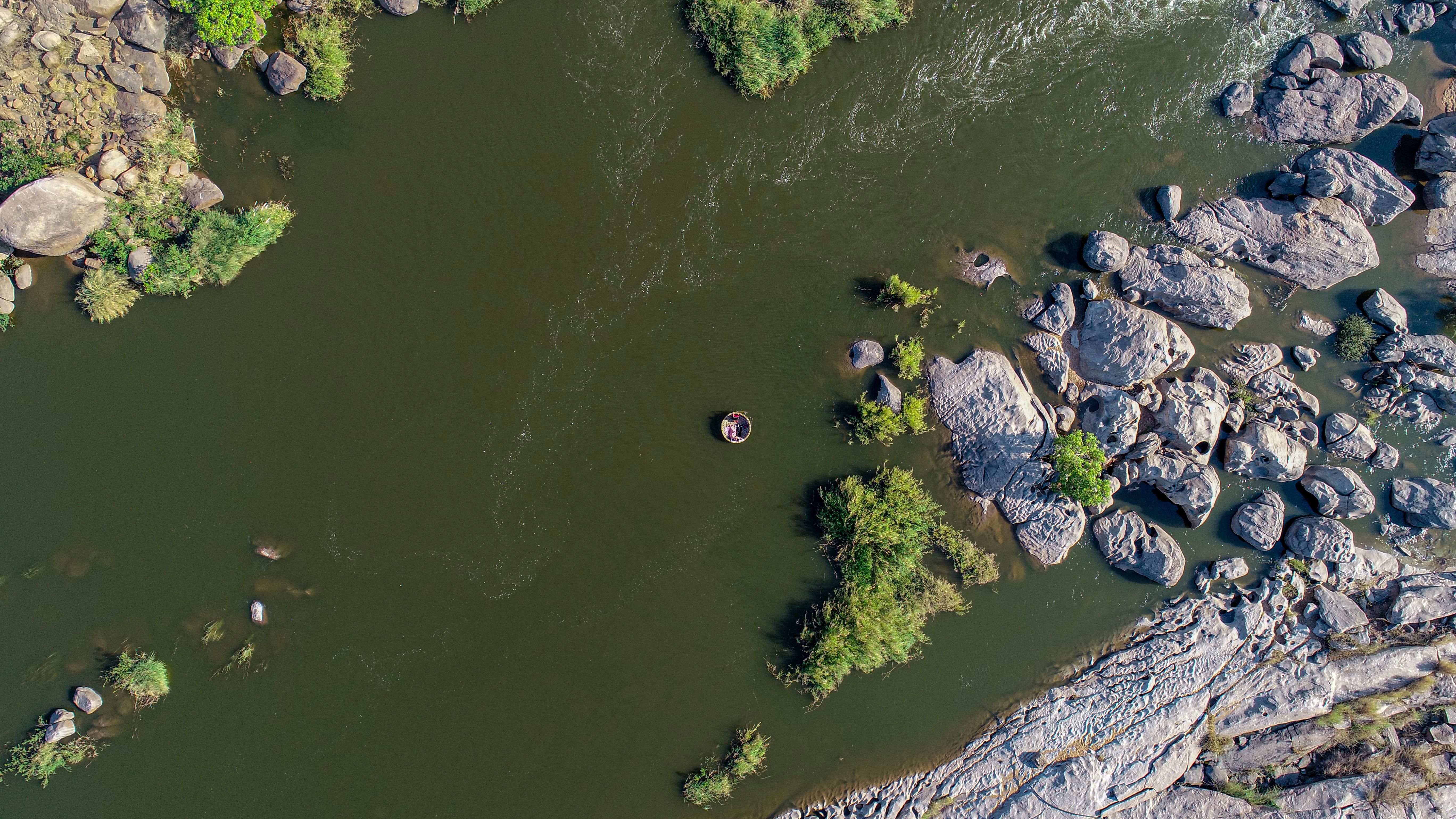Aerial View of Serene River Landscape with Rock Formations · Free Stock ...