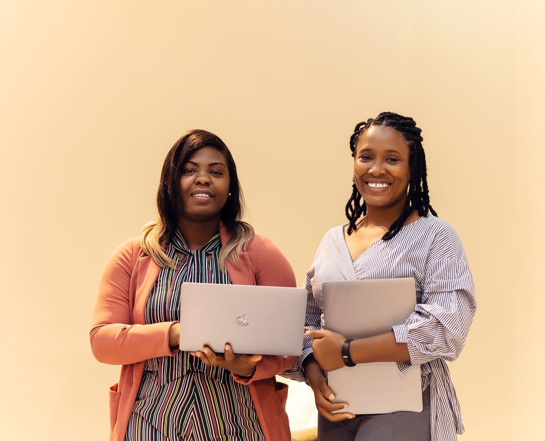 African businesswomen working with laptops