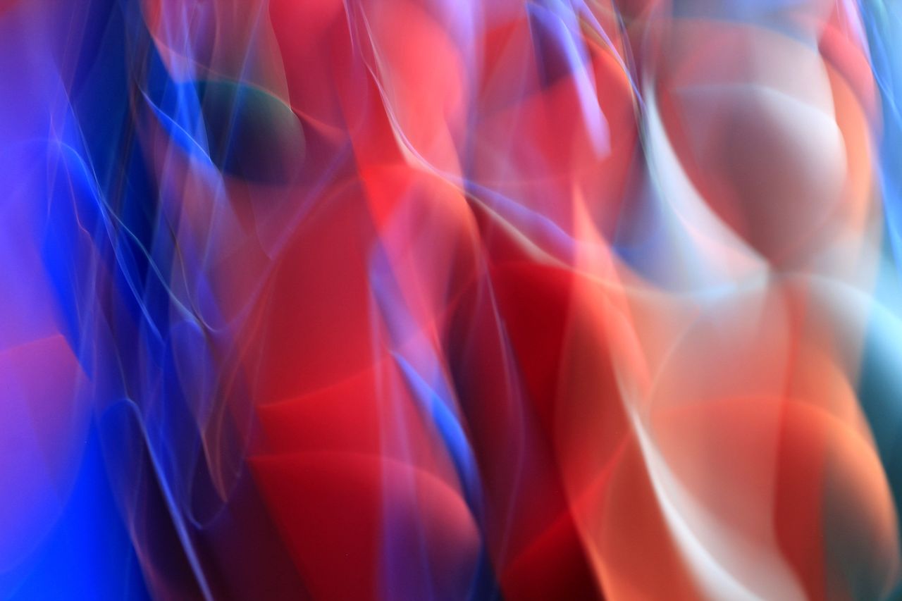 vivid abstract light painting with dynamic red and blue colors blendin