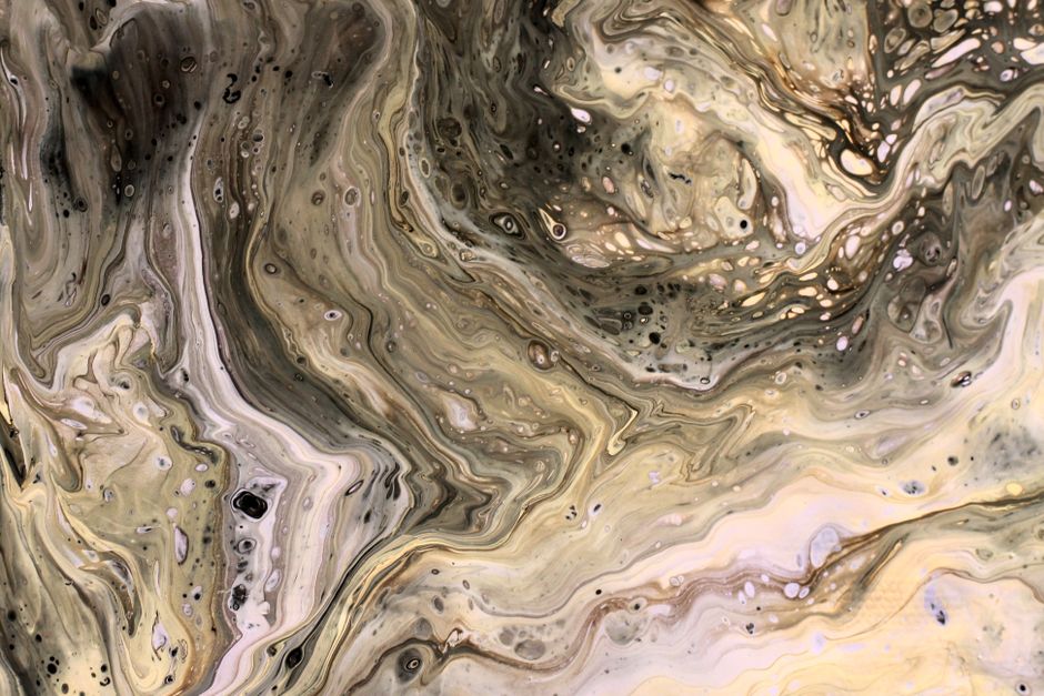 Intricate marbled patterns in neutral earth tones create a mesmerizing abstract artwork.