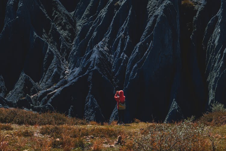 Person Taking Photo Of A Mountain