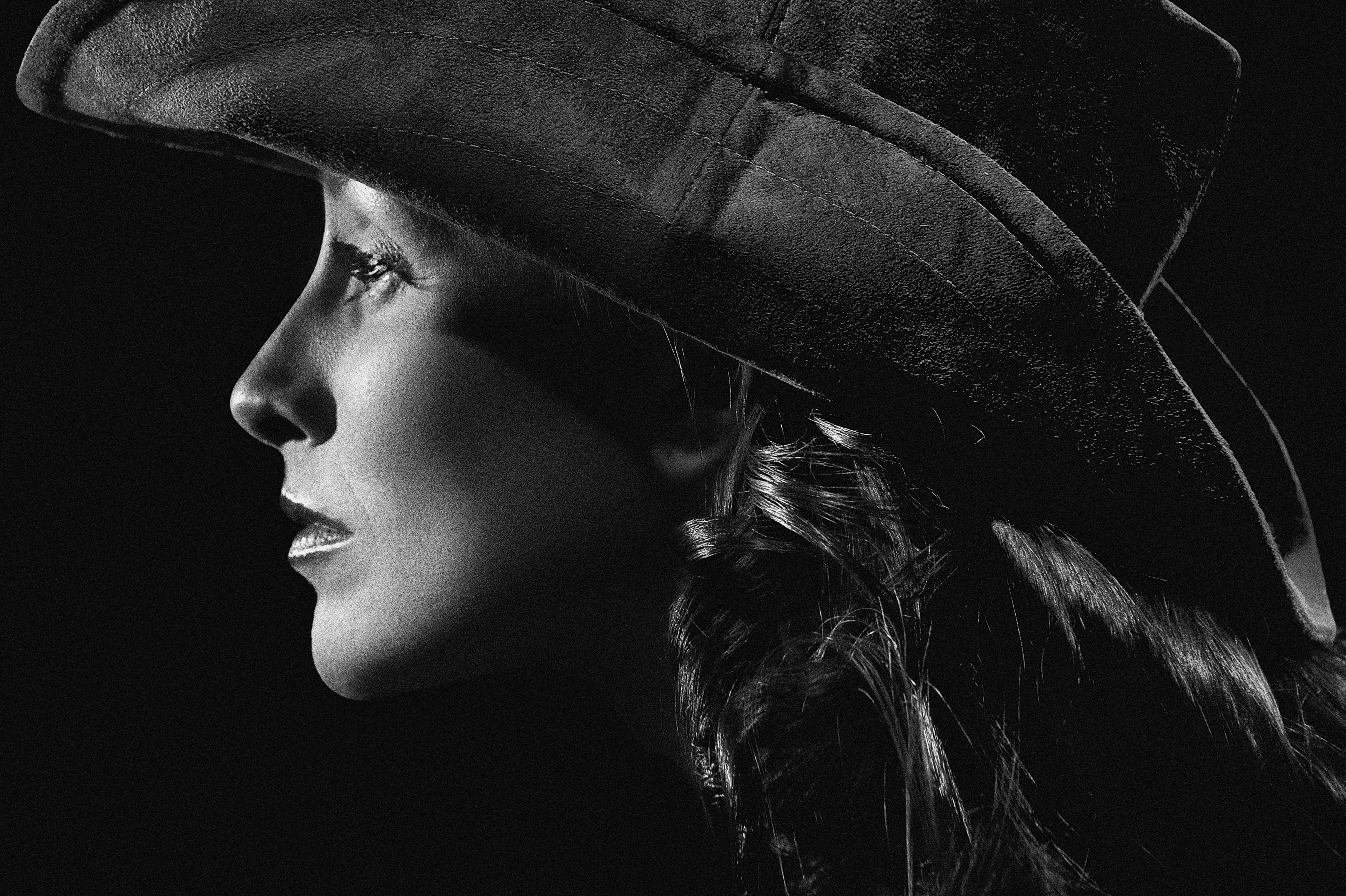Black and White Portrait of Woman in Hat · Free Stock Photo