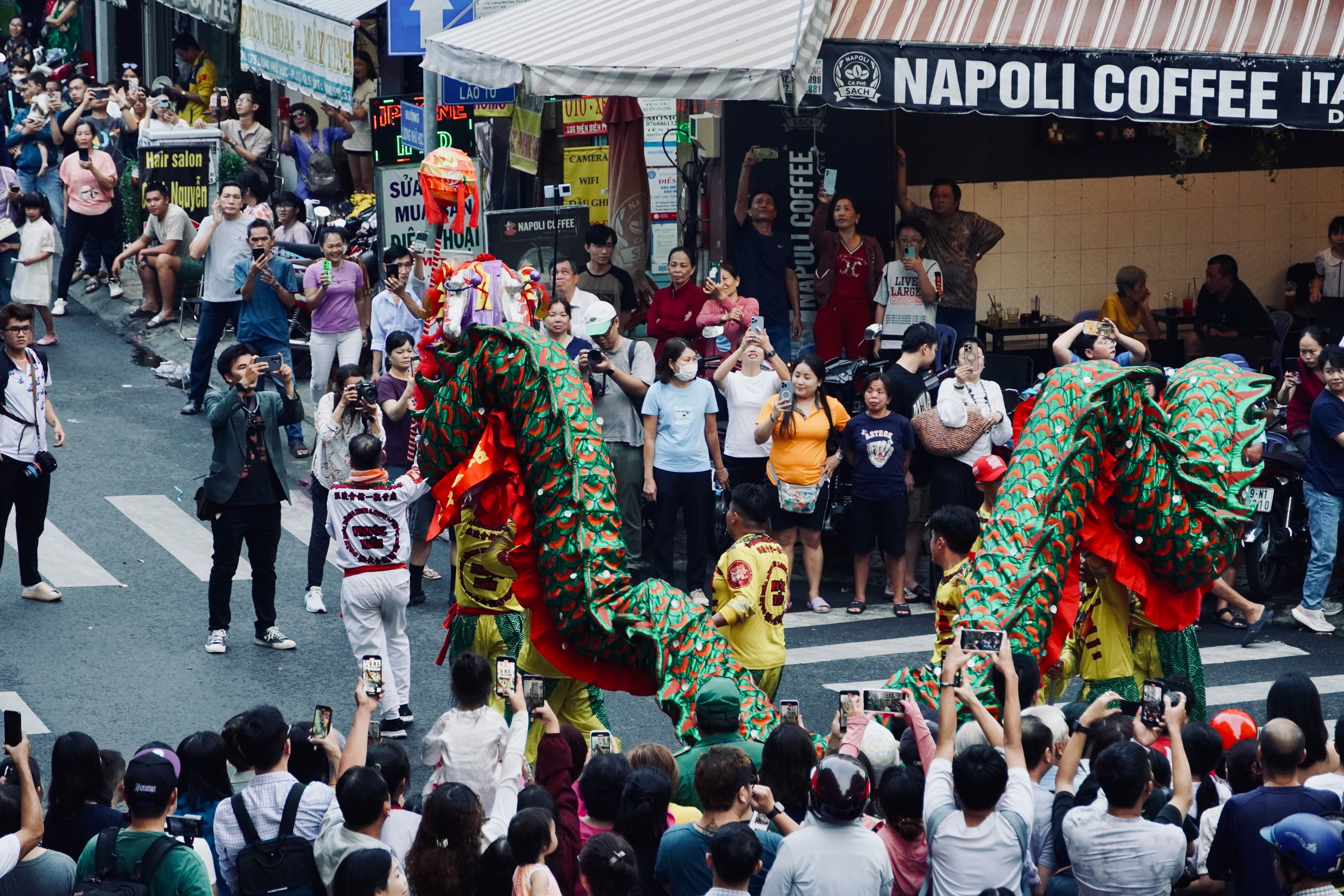 Vibrant Street Parade with Dragon Dance · Free Stock Photo