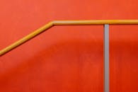 Minimalist Staircase with Wooden Railing