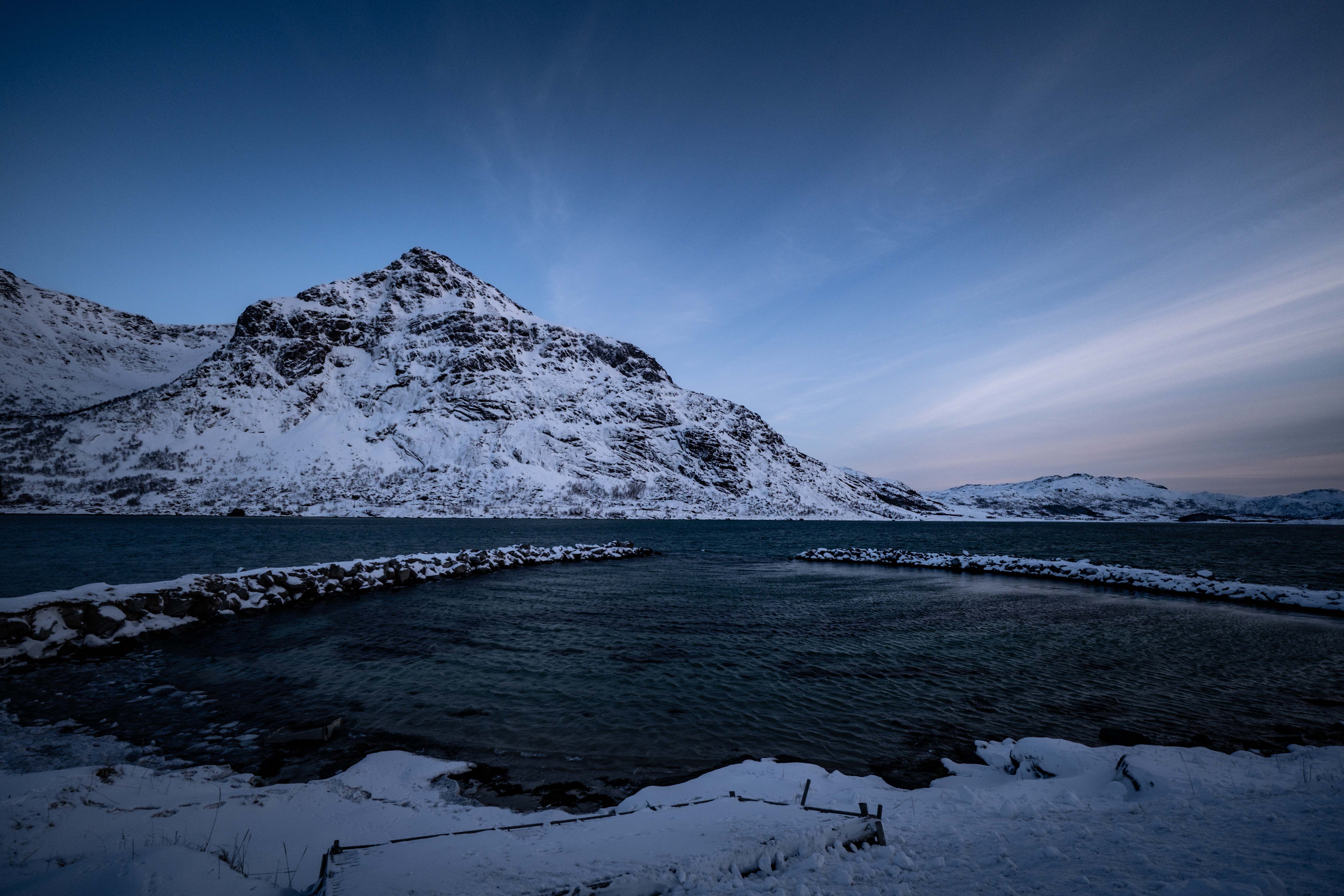 Snow-Covered Mountains in Serene Winter Landscape · Free Stock Photo
