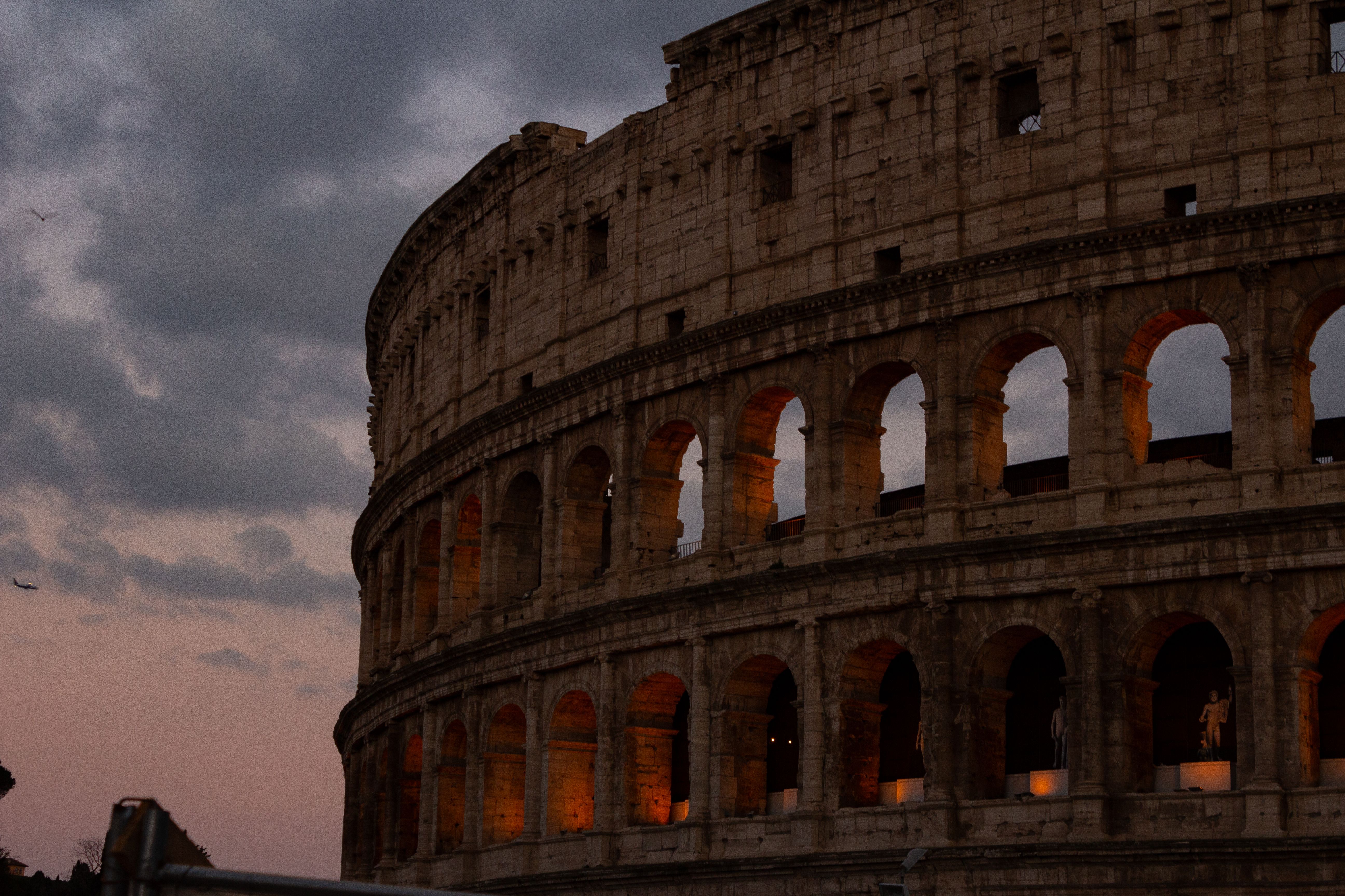 Colosseum at Dusk in Rome with Dramatic Sky · Free Stock Photo