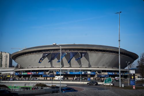 Free Spodek Arena in Katowice featuring a vibrant esports event atmosphere with banners. Stock Photo