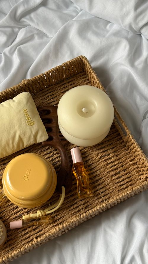 Free Serene arrangement of spa items on a wicker tray against a soothing backdrop. Stock Photo