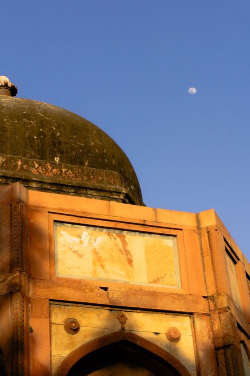Free Beautiful dome architecture with visible moon in New Delhi, India captured at sunset. Stock Photo