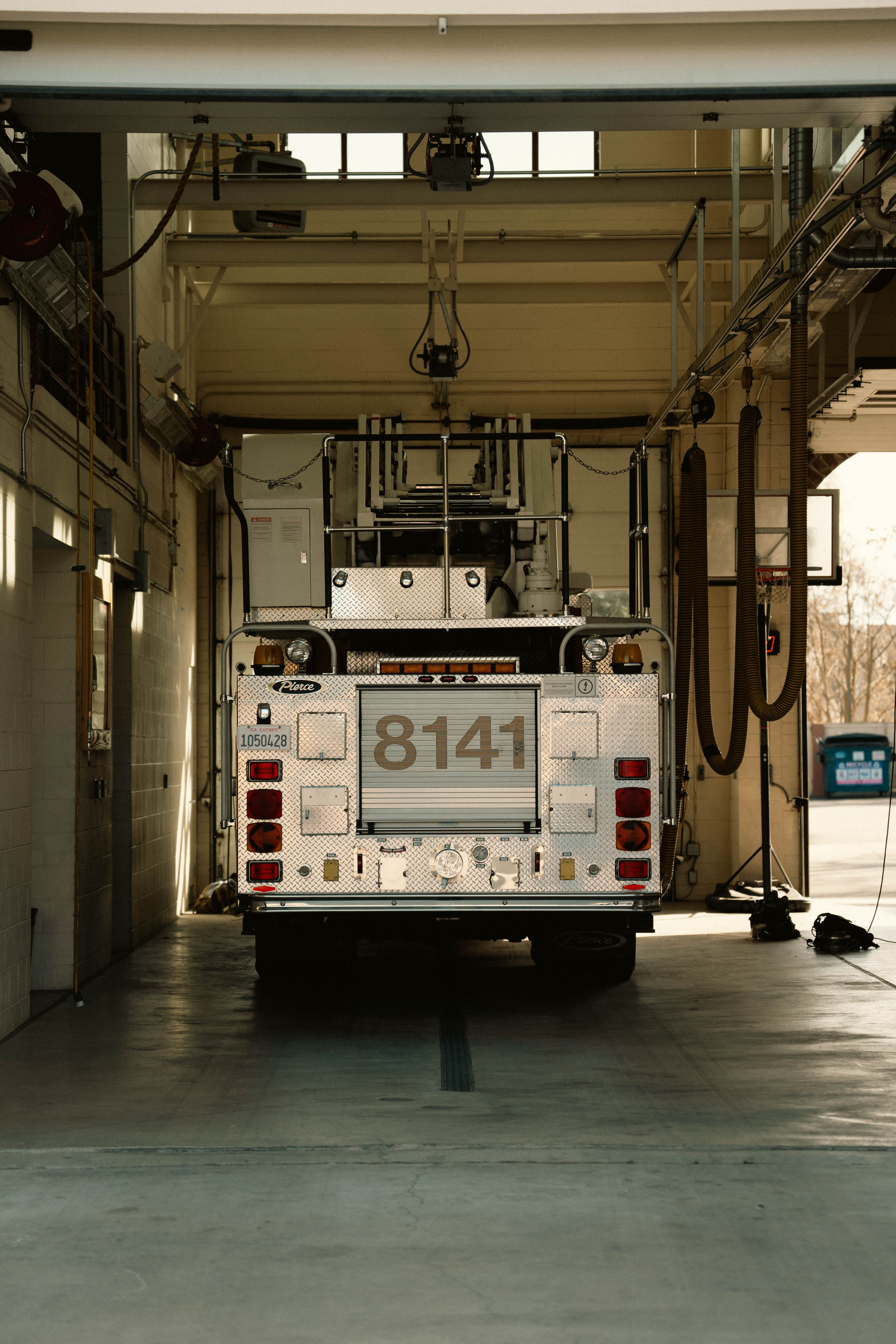 Fire Truck in Station Garage with Number 8141 · Free Stock Photo