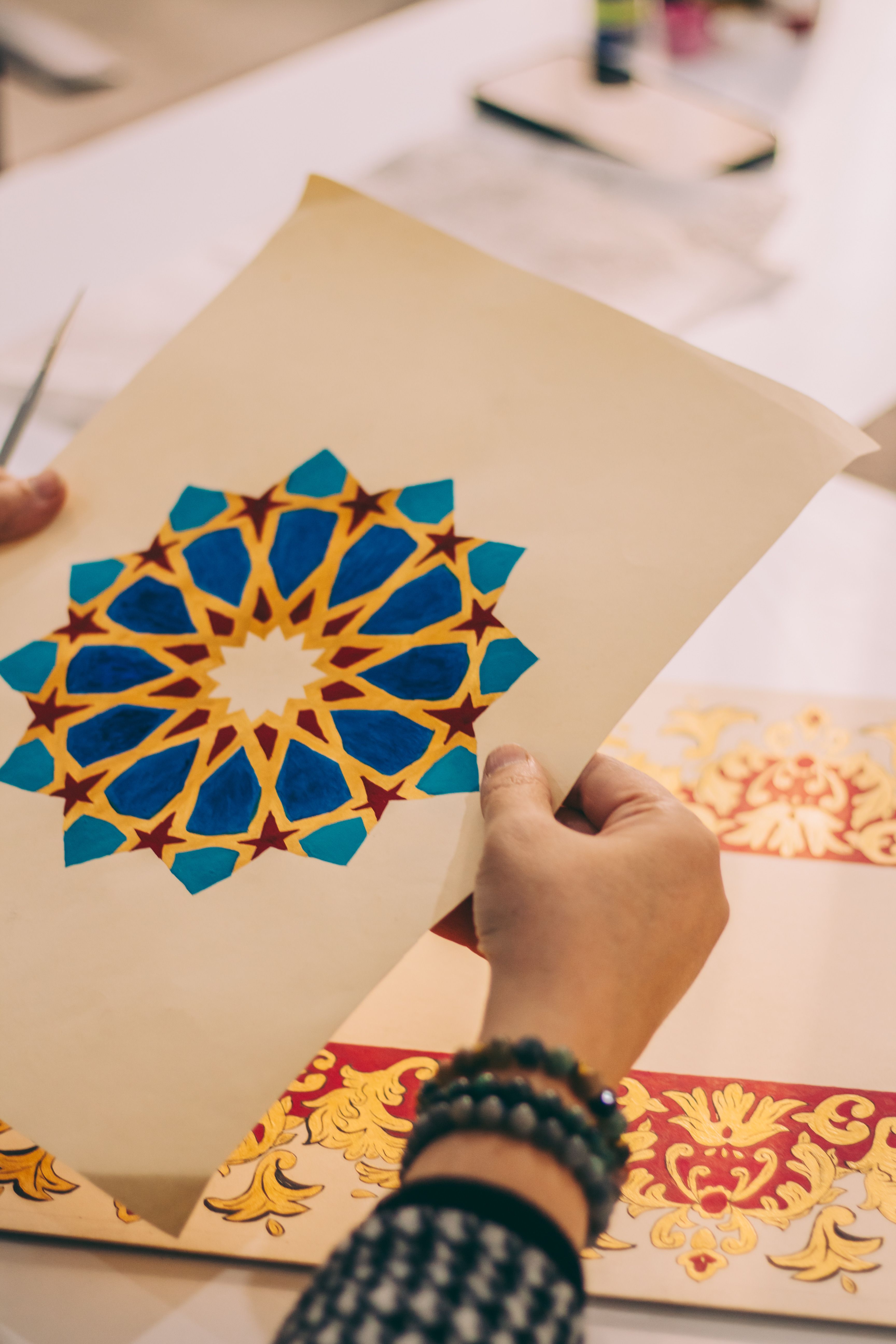 Crafting Intricate Islamic Geometric Design Art · Free Stock Photo