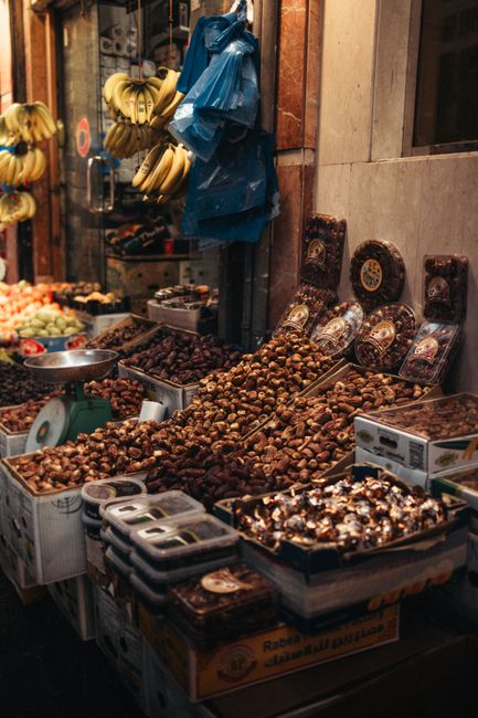 A vibrant display of dried fruits and nuts in a traditional market setting, showcasing rich cultural diversity. - Price vs. Quality Considerations in Dry Fruits