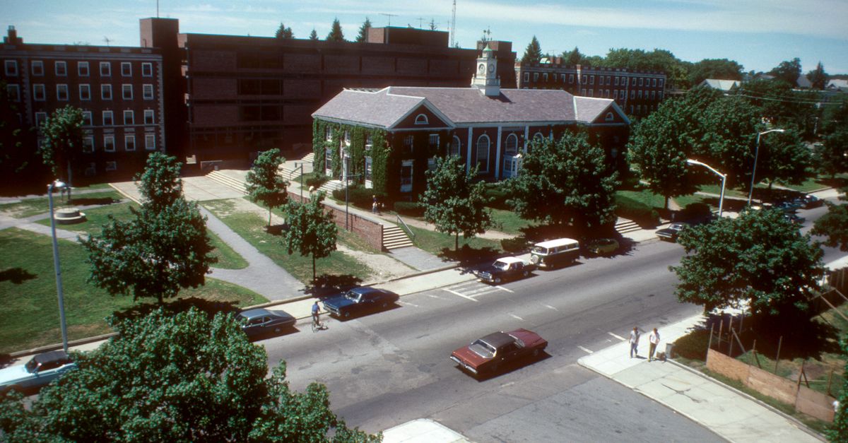 Aerial photo of a college campus in Lowell, showing classic architecture and tree-lined streets.
