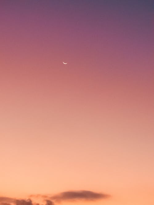 Free Moon on an Afterglow Background Stock Photo