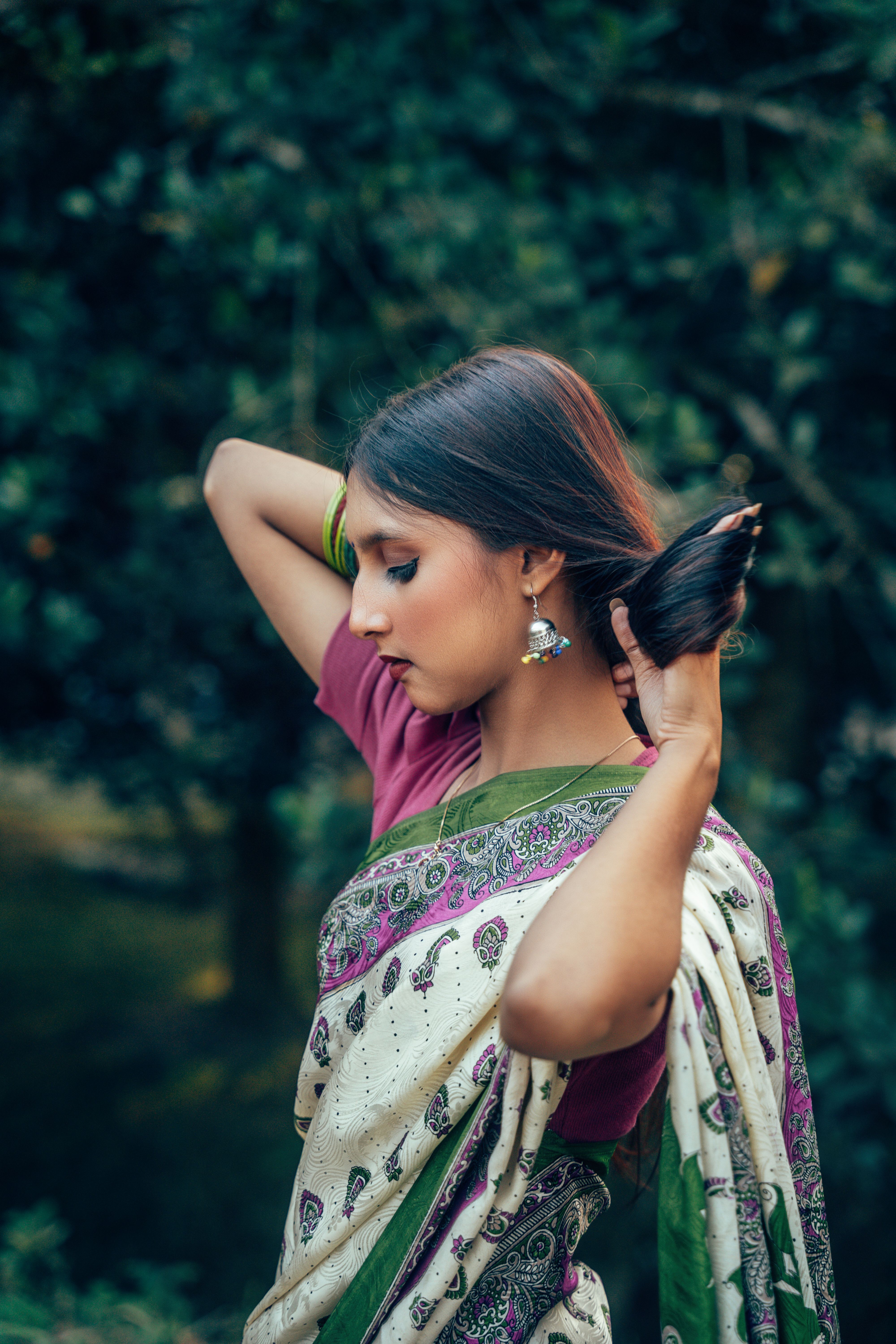 Elegant Woman in Traditional Bengali Saree · Free Stock Photo