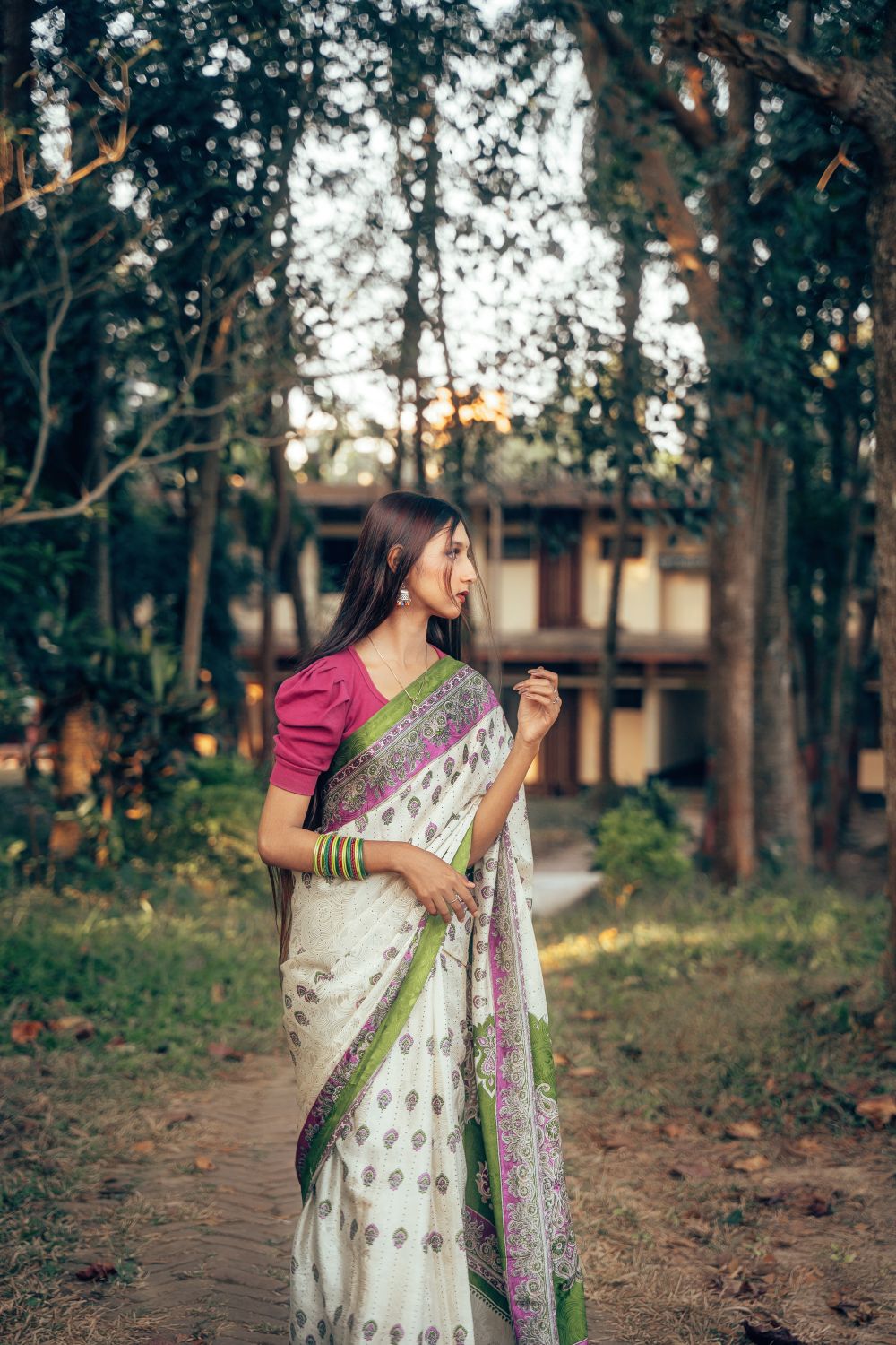 Elegant Woman in Traditional Bengali Saree Outdoors · Free Stock Photo