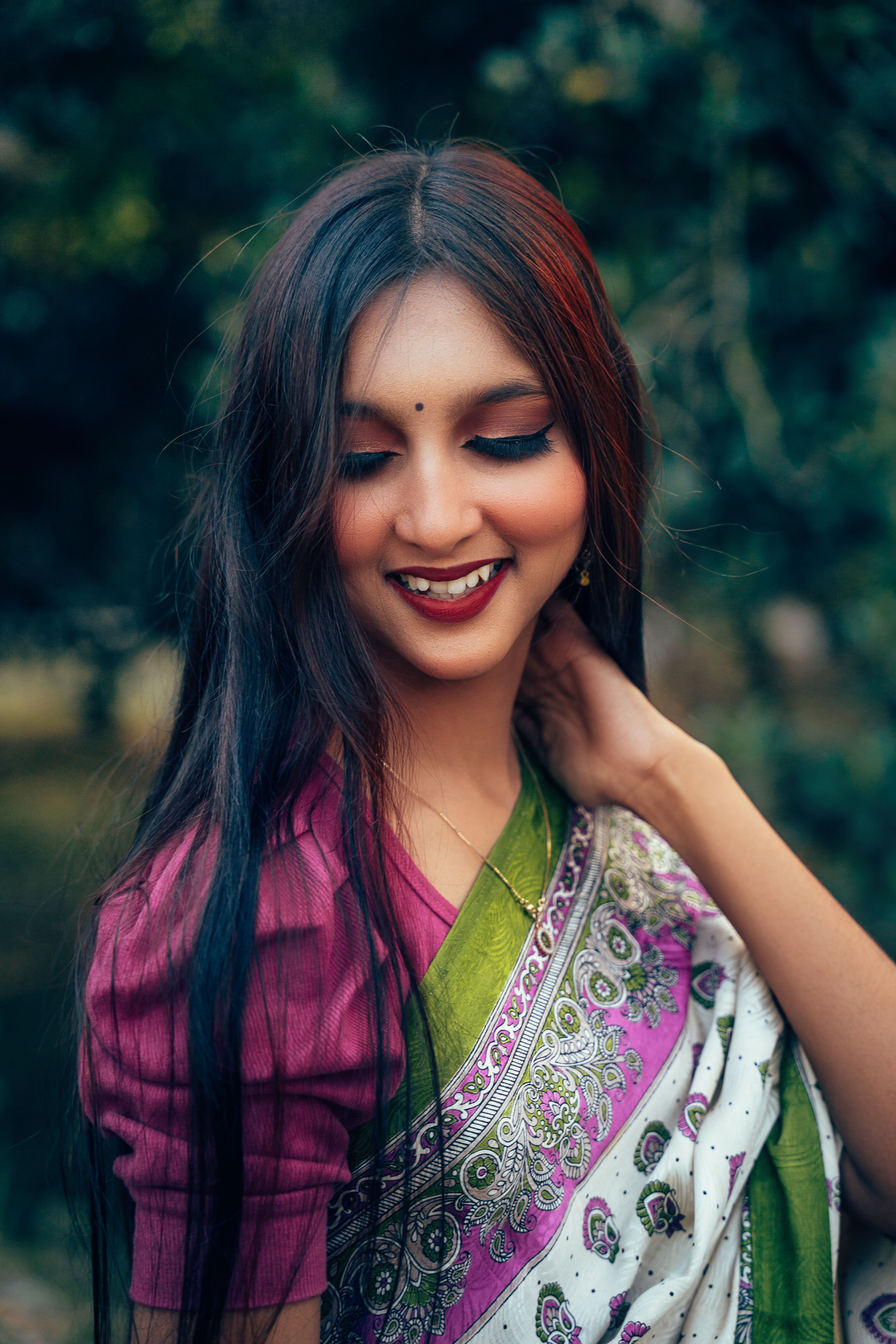 Elegant Woman in Traditional Bengali Saree Outdoors · Free Stock Photo