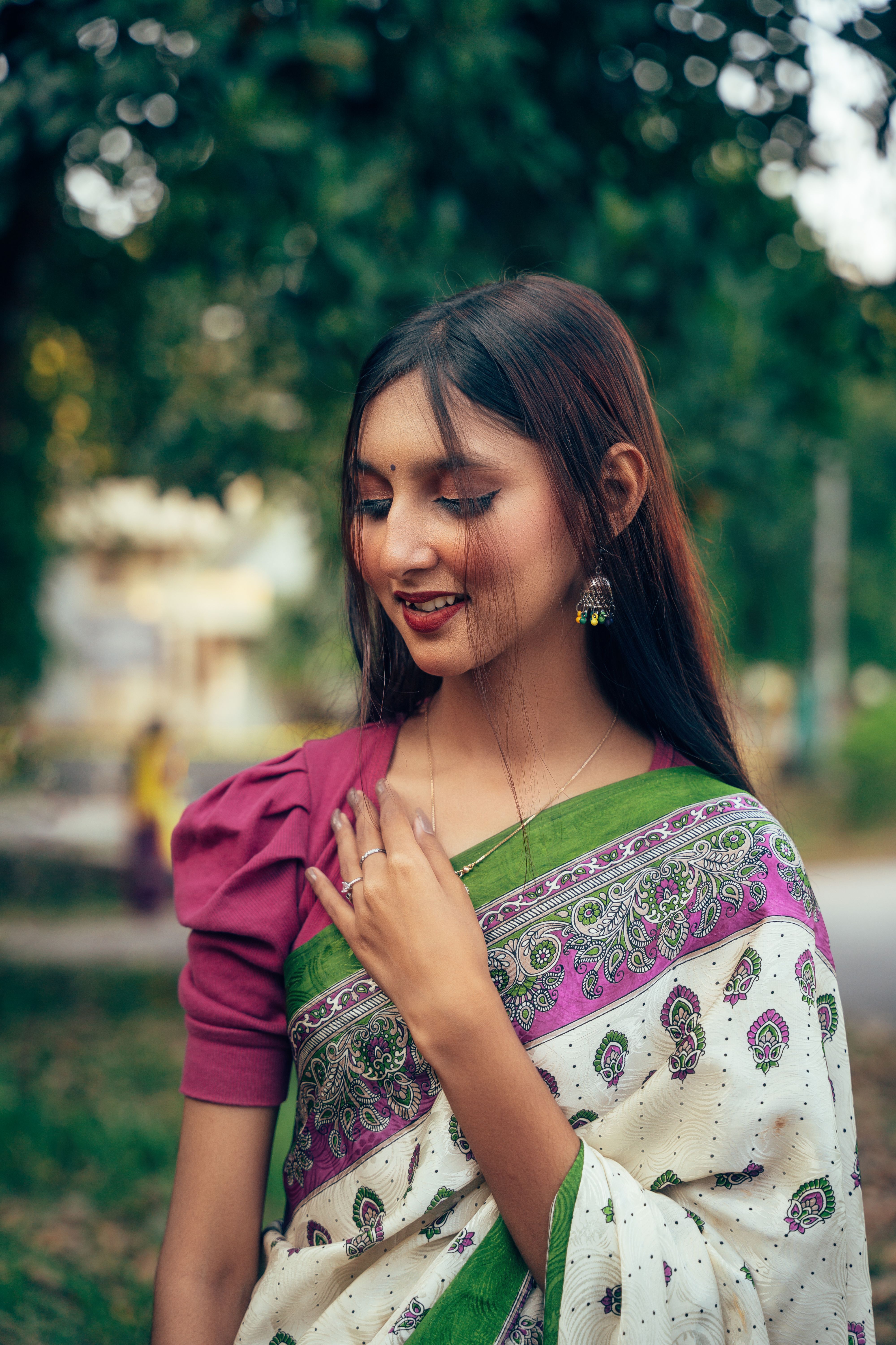 Elegant Bengali Woman in Traditional Saree Outdoors · Free Stock Photo