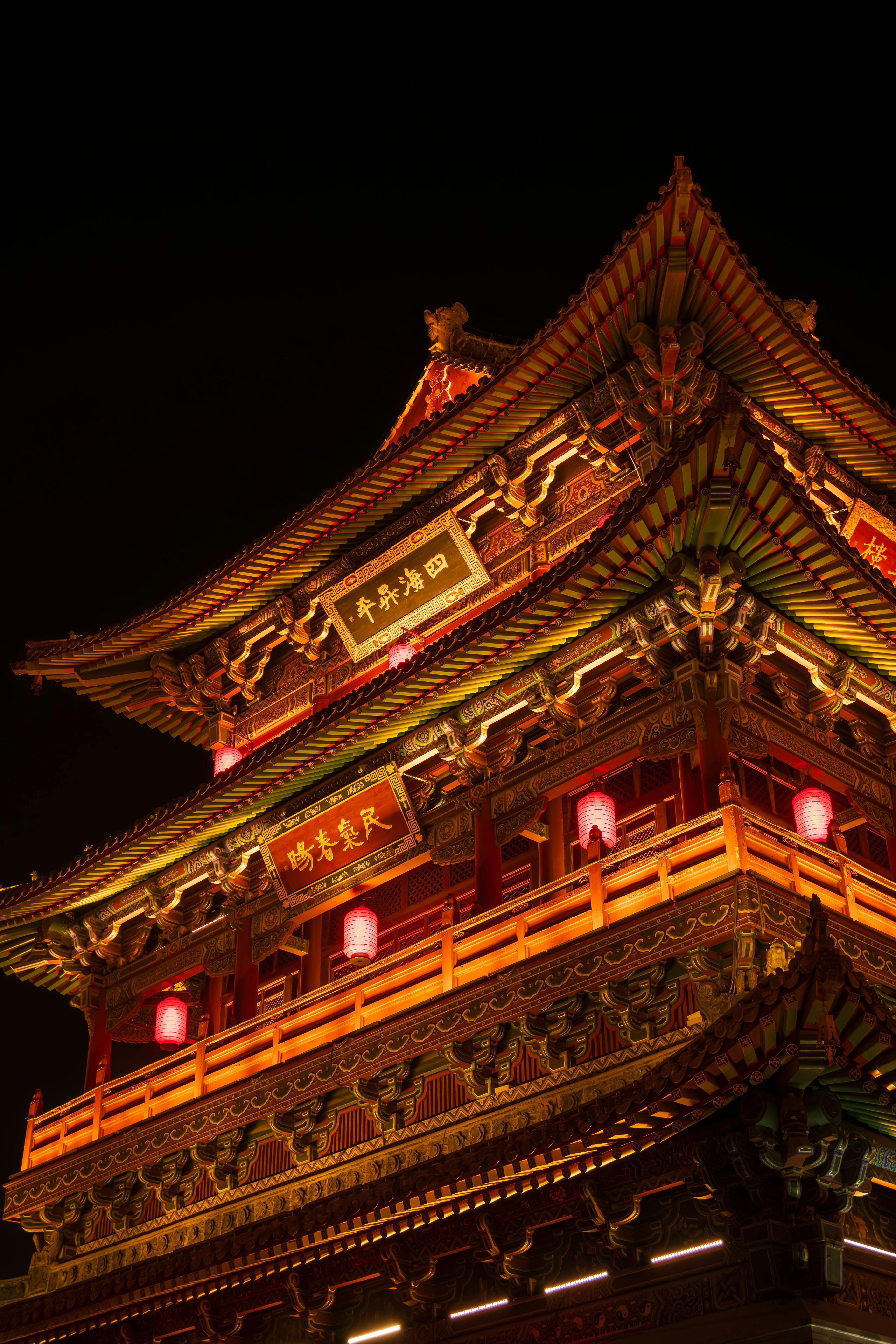 illuminated chinese pagoda at night