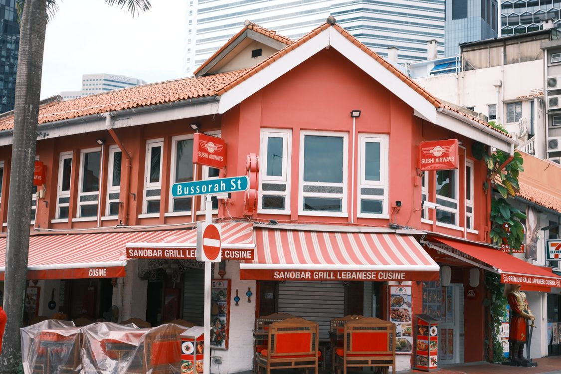 Colourful Singapore shophouse facades on Bussorah Street
