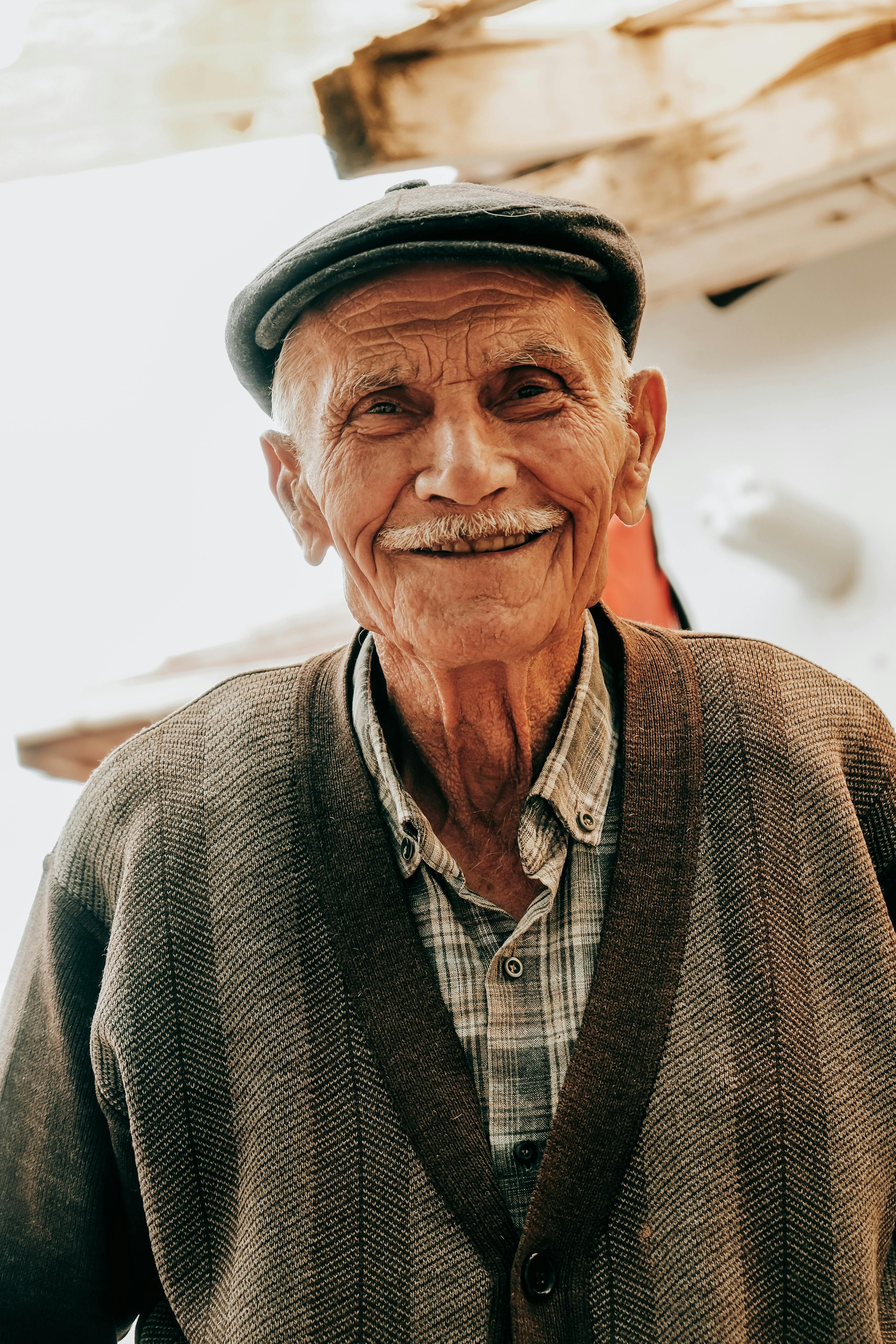 Smiling elderly man in traditional Turkish setting