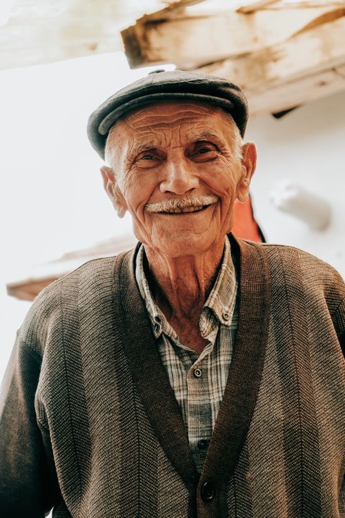 Free Charming portrait of a senior man smiling warmly outdoors in Türkiye. Stock Photo
