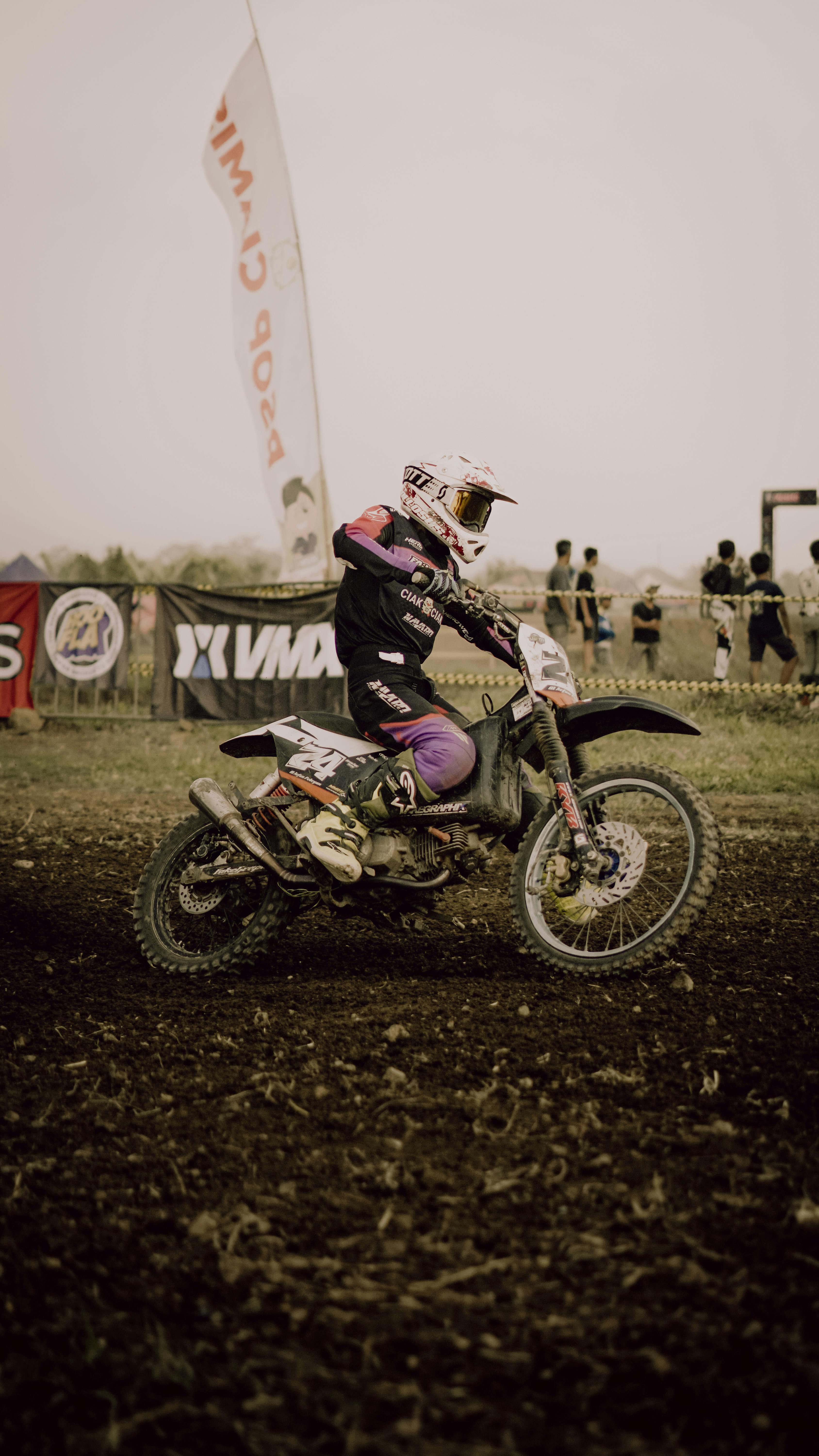 Thrilling motocross competition in Indonesia showcasing skilled racers and dynamic action.