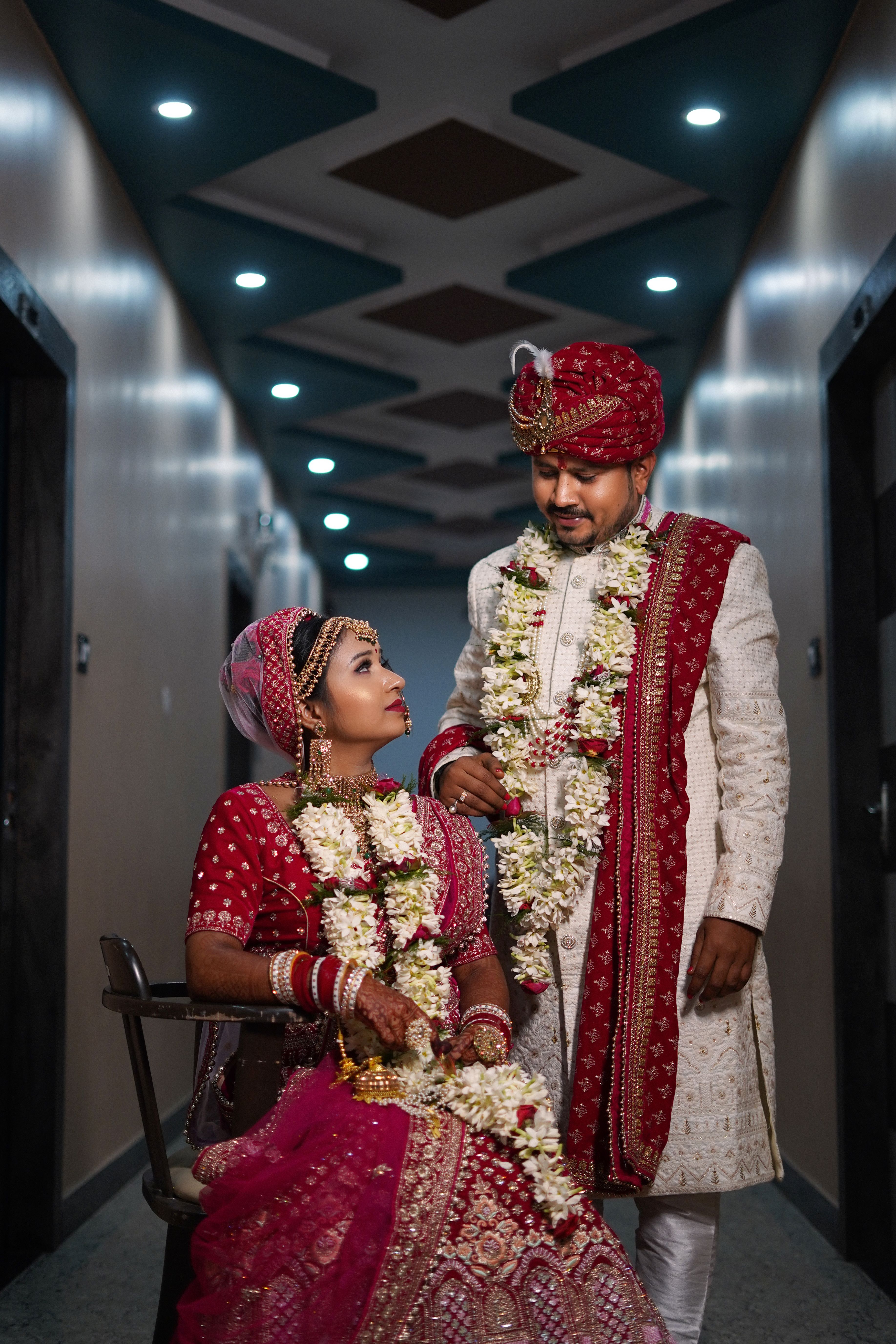 Elegant Indian Wedding Couple in Traditional Attire · Free Stock Photo