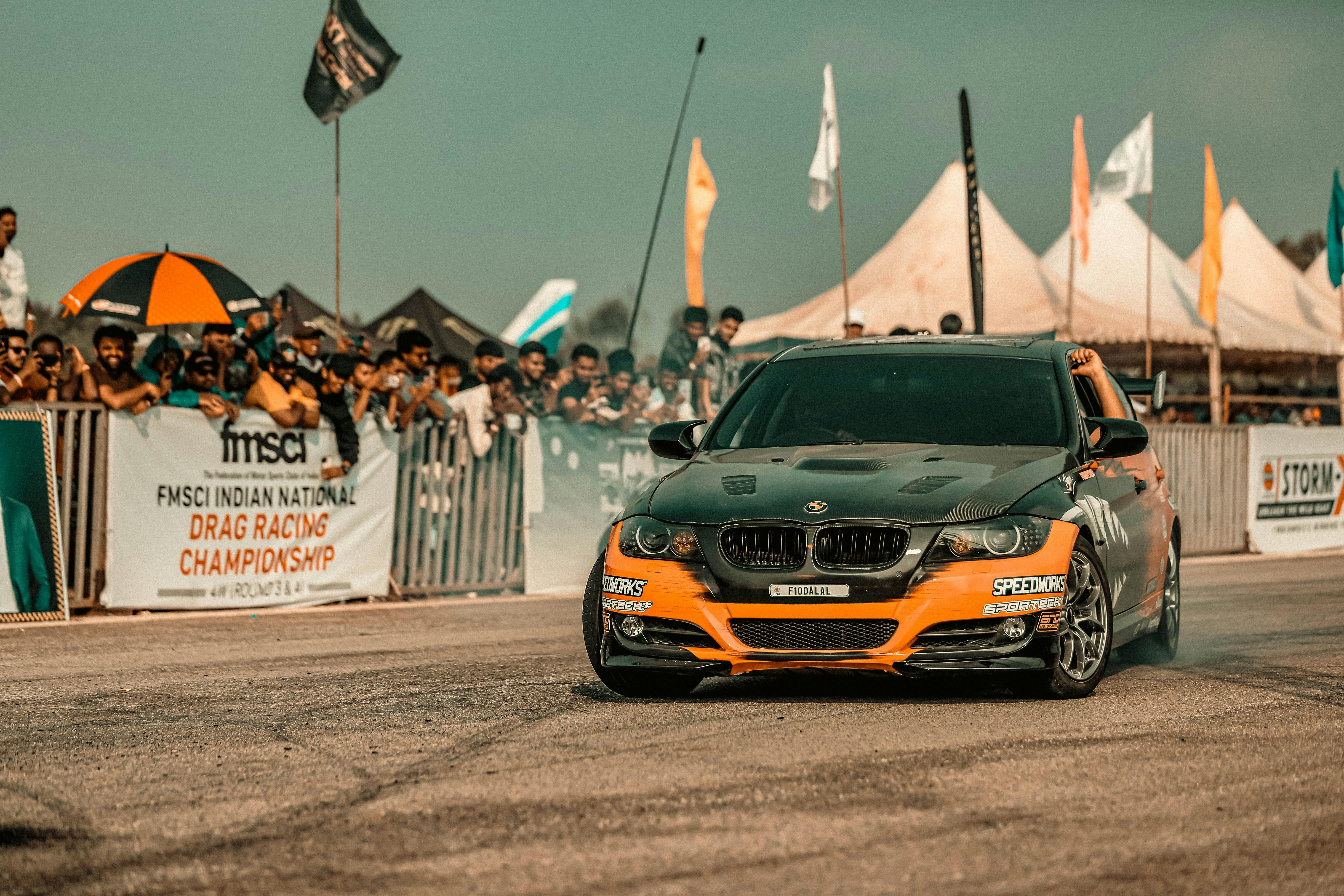 Exciting Drag Racing Car Competing at an Event · Free Stock Photo