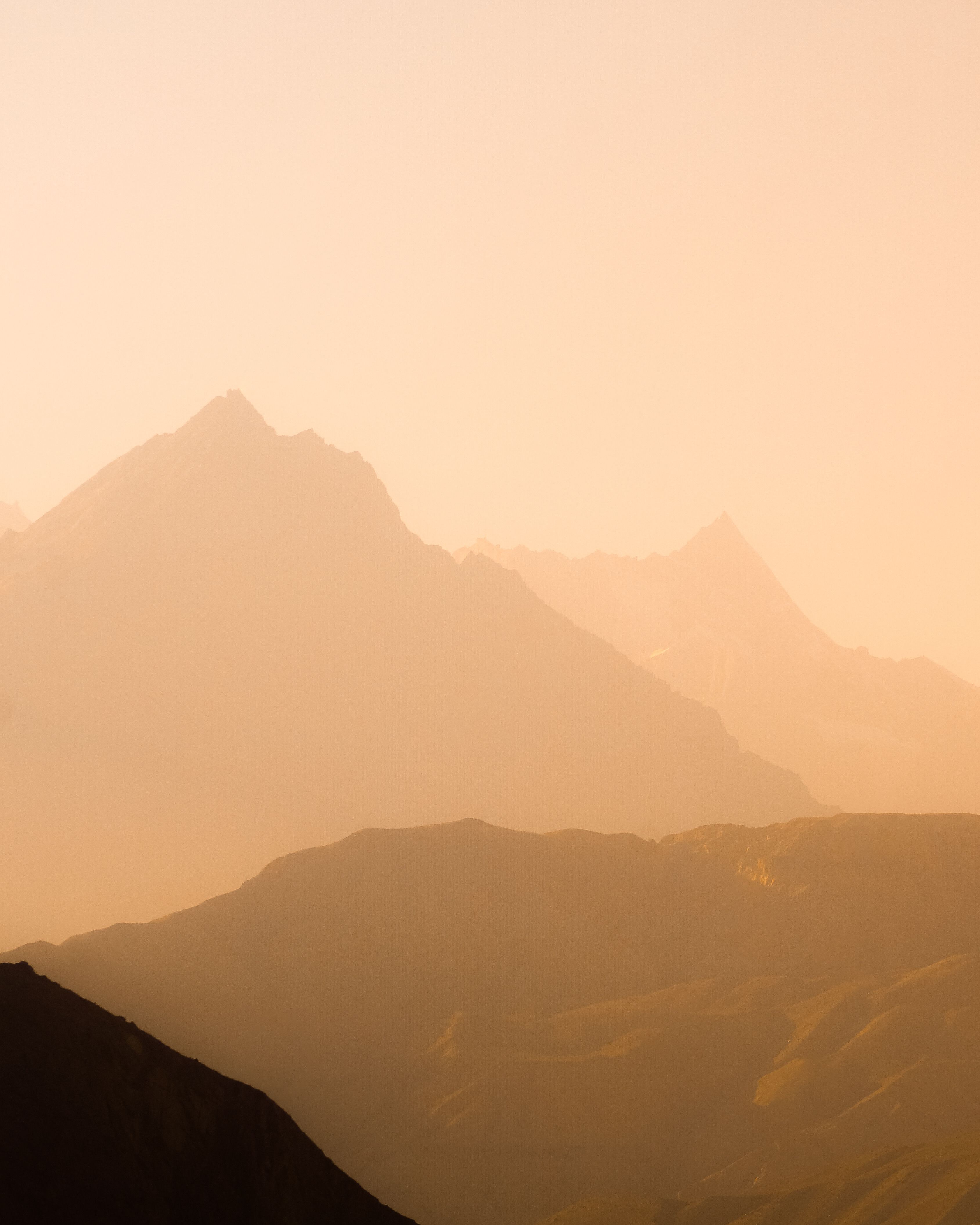 Serene Mountain Range at Golden Hour · Free Stock Photo