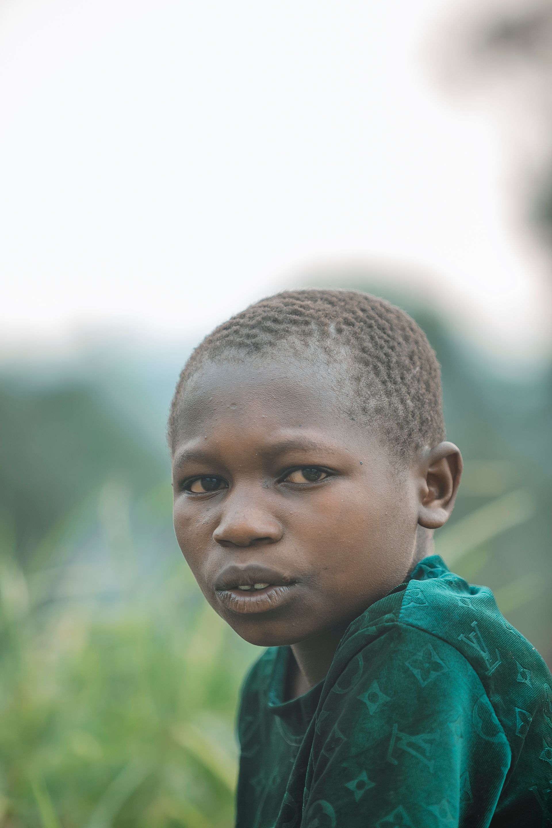 Portrait of a Young Boy in Natural Setting · Free Stock Photo